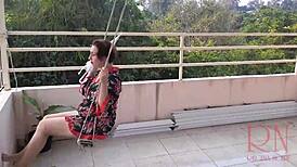depraved housewife swings without panties under umbrella full video