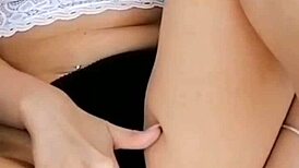 young pussy gets sweet morning masturbation in close-up view. nylon legs spread wide for solo play.