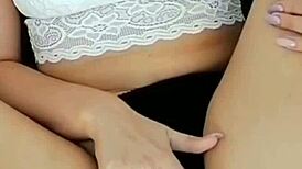 young pussy gets sweet morning masturbation in close-up view. nylon legs spread wide for solo play.