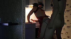 Asmodey and Jasper cook dinner in the kitchen