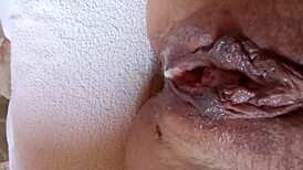 Spanish housewife masturbates while flashing neighbors in exhibitionist fetish.