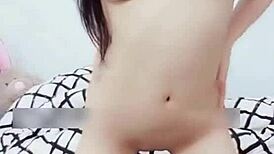 chinese cam girl rides dildo hard