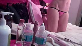 Blonde's Big Tits Tease In See-Thru Bikini Cam