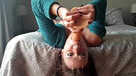 She says, 'Watch this upside down dildo gag deepthroat with choking.'