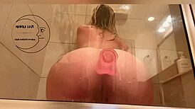 Her pussy drips after intense anal play in the steamy shower.