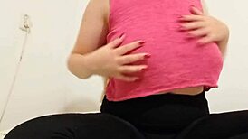 cowgirl in pink top, 'want to see me play with big boobs?'