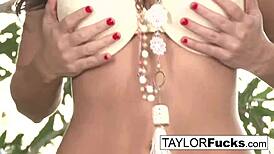 Taylor masturbates pussy with toys outdoors. Big tits on display.