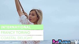 Blonde milf Francy Torino strips outdoors, revealing perfect ass and small tits in a raw naked pose.