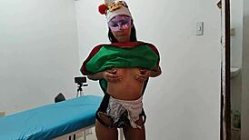 Sensual female elf indulges in christmas sex fantasies on hospital gurney