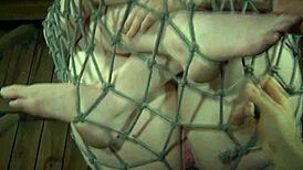 Bound submissive feels humiliation during whipping punishment