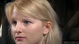 Bound submissive feels humiliation during whipping punishment