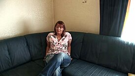 Fat milf with saggy tits plays with dildo solo. Her horny moans fill the room.