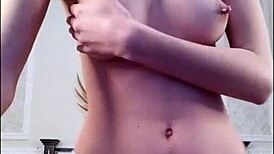 Blonde teen displays her figure in panties.