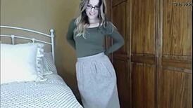 i saw a beautiful woman in glasses undressing