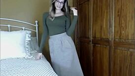 i saw a beautiful woman in glasses undressing