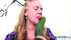 i love watching lily may slide a big toy into her mature pussy