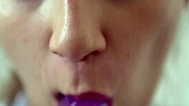 Teen sucking dildo in close-up solo session