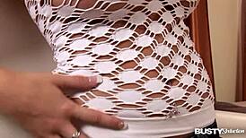 Busty Natalia Seduces with Strokes on Her Massive Tits.