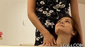 cute gals are licking each other