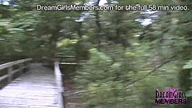 Bold natural redhead streaking in public park