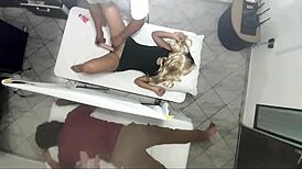 Real video of masseur having sex with woman next to her husband.