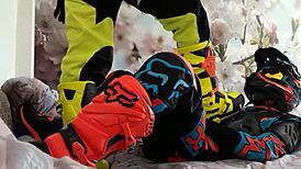 Gay biker treads boots in motocross costume fun
