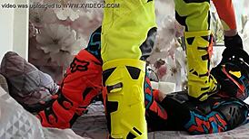 Gay biker treads boots in motocross costume fun