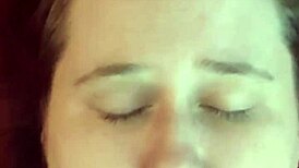 An amateur girl casually gets her face covered in cum