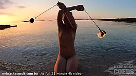 Nude Fire Dancing On The Beach At Sunset