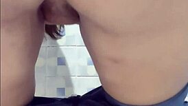 Hidden Camera Captures Mature Latina In Bathroom