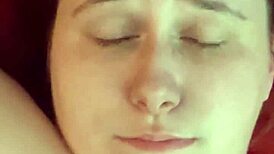 An amateur girl casually gets her face covered in cum