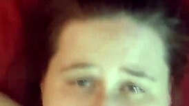 An amateur girl casually gets her face covered in cum