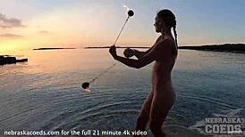 Nude Fire Dancing On The Beach At Sunset