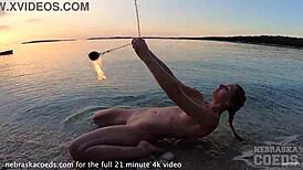 Nude Fire Dancing On The Beach At Sunset