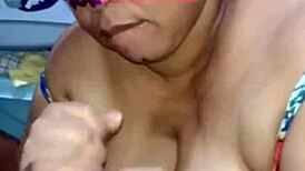 Watch this mature BBW puta jerking and milking cock in lingerie