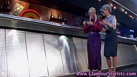 Hey, check out this babe fingering a clothed slut in satin