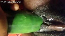 Suggestive cyndy blackslave drills cucumber deep with wild squirt on webcam