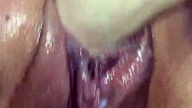 A couple explores squirting insertions on big pussy close-up