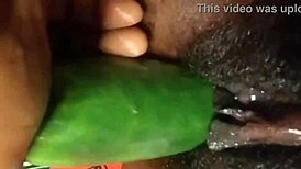 Suggestive cyndy blackslave drills cucumber deep with wild squirt on webcam