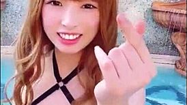watch japanese babe with big boobs in a sexy pool dance