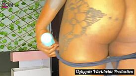 african lady in red with tattoos