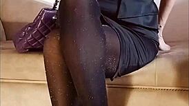 Shiny pantyhose pee in toilet with heels and feet.