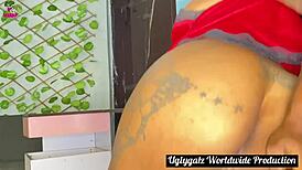 african lady in red with tattoos