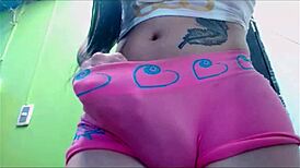 Transsexual Babe Teases in Pink Undies on Webcam