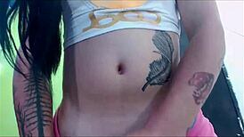 Transsexual Babe Teases in Pink Undies on Webcam