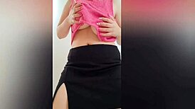 Sexy student with perfect body and big tits films herself in black skirt on camera