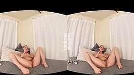 Flexible beauty Iris Ives yanks and fingers her toes during solo masturbation.