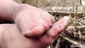 Goddess Teases with Feet in Tan Pantyhose in Spring Forest