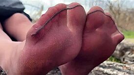 Goddess Teases with Feet in Tan Pantyhose in Spring Forest