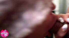 A brunette with a blindfold gives a deep throat blowjob and gets a facial in POV